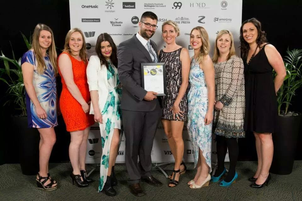 The Amy’s Flowers team celebrating a Top Shop achievement